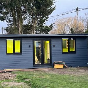 Annexe set back in garden