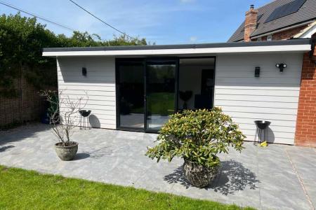 Self-contained annexe extension, shown attached to the house