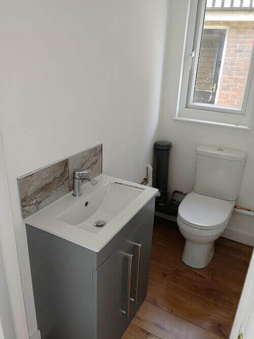 Office toilet room, with sink unit